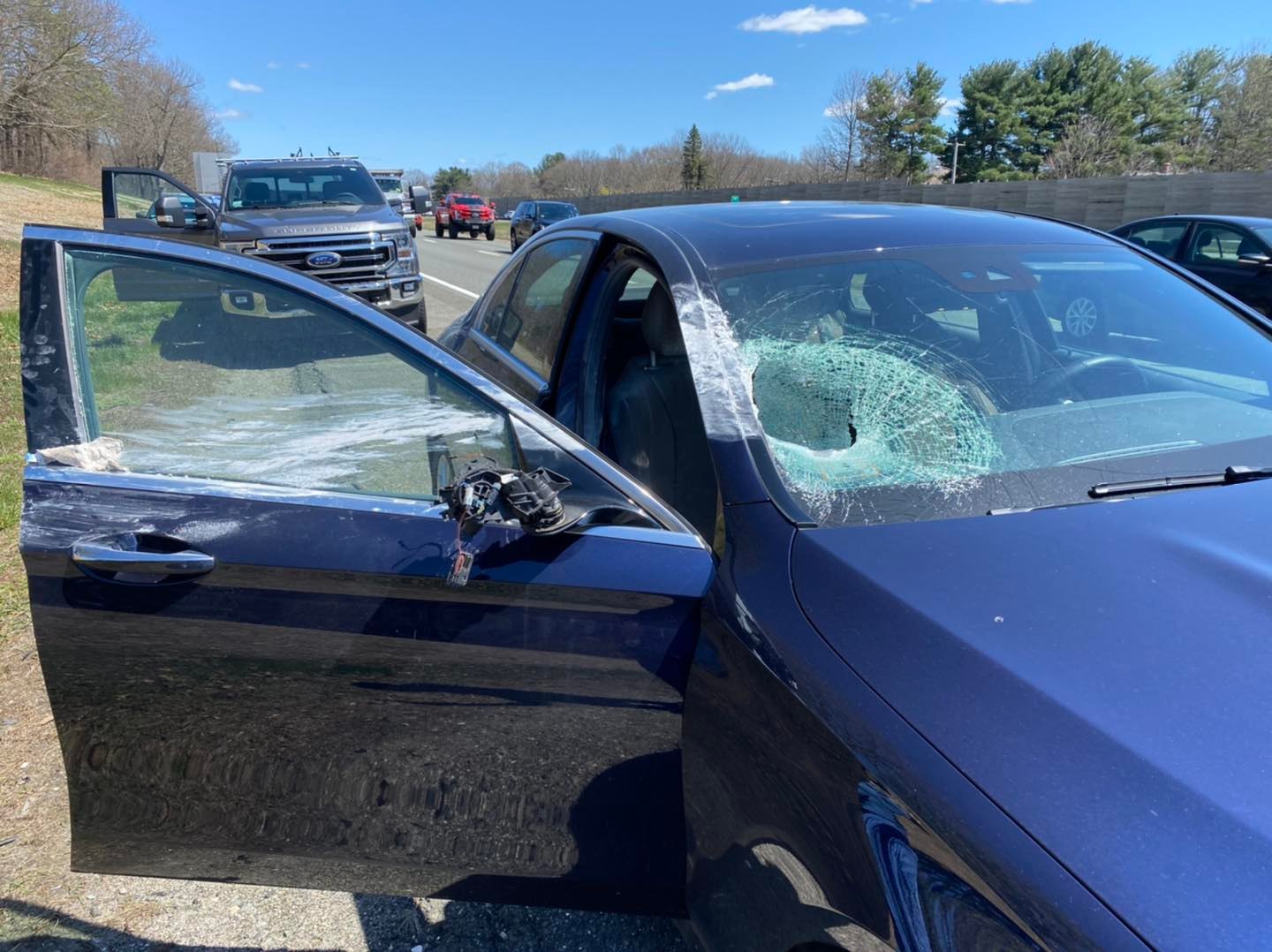One sent to the hospital after unsecured load crashes through windshield on Massachusetts highway