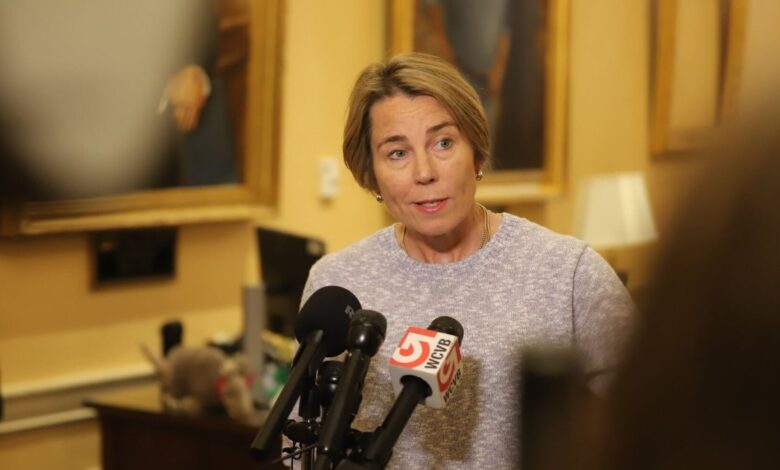 Gov. Maura Healey speaks to reporters at the State House